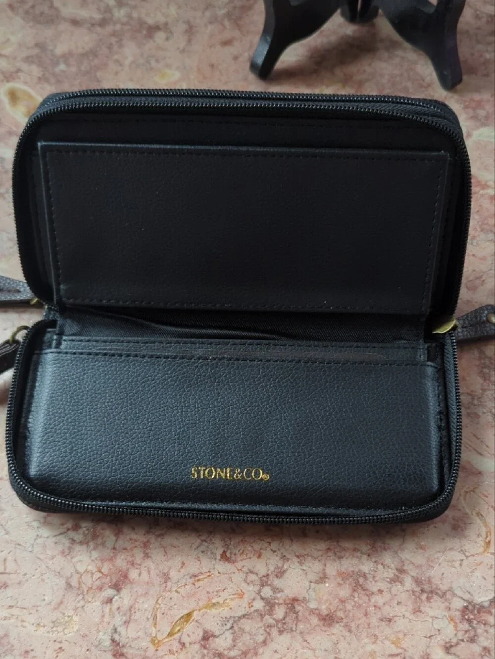 Stone & Co. Black and Brown Leather Wristlet Clutch with Gold Emblem